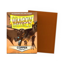 Load image into Gallery viewer, Dragon Shield Standard Size Matte Card Sleeves in Copper are for sale at Gecko Cards! With free UK Postage on all orders over £25 - see the range of Yu-Gi-Oh! Cards, Booster Boxes, Card Sleeves and other trading card game products on our store - all at great prices!
