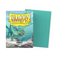 Load image into Gallery viewer, Dragon Shield Standard Size Matte Card Sleeves in Mint are for sale at Gecko Cards! With free UK Postage on all orders over £25 - see the range of Yu-Gi-Oh! Cards, Booster Boxes, Card Sleeves and other trading card game products on our store - all at great prices!
